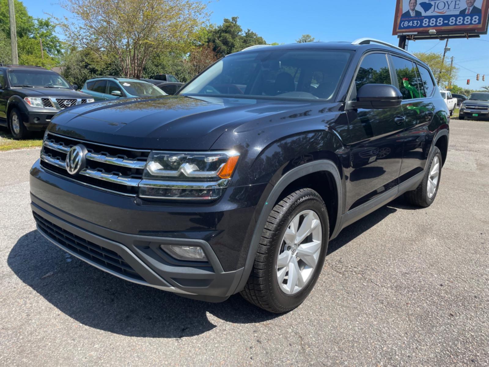2019 BLACK VOLKSWAGEN ATLAS V6 SE (1V2DR2CA0KC) with an 3.6L engine, Automatic transmission, located at 5103 Dorchester Rd., Charleston, SC, 29418-5607, (843) 767-1122, 36.245171, -115.228050 - Local Trade-in with Leather, Third Row, Backup Camera, AUX/Bluetooth/USB, Dual Climate Control, Power Everything (windows, locks, seats, mirrors), Heated Seats, Rear In-door Sunshades, Push Button Start, Keyless Entry, Alloy Wheels. 121k miles Located at New Life Auto Sales! 2023 WINNER for Post & - Photo #2